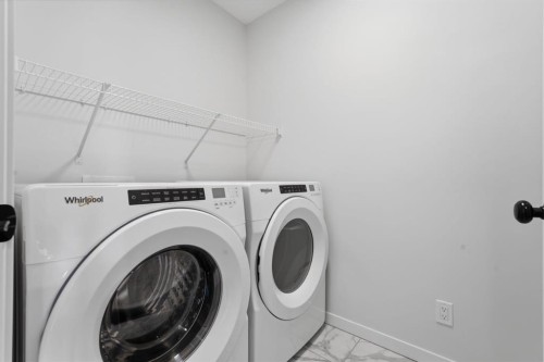20305 45 Street Se, Calgary, AB - Indoor Photo Showing Laundry Room