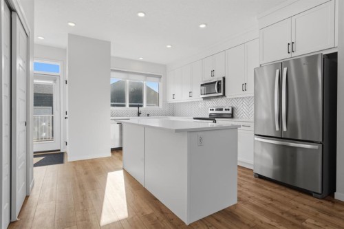 20305 45 Street Se, Calgary, AB - Indoor Photo Showing Kitchen With Stainless Steel Kitchen With Upgraded Kitchen