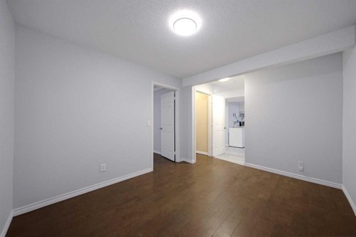 133 Saddlecrest Green Ne, Calgary, AB - Indoor Photo Showing Other Room