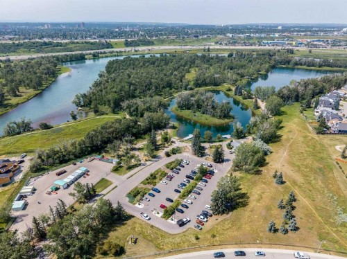 116 Riverbirch Crescent Se, Calgary, AB - Outdoor With Body Of Water With View
