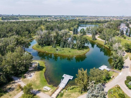 116 Riverbirch Crescent Se, Calgary, AB - Outdoor With Body Of Water With View