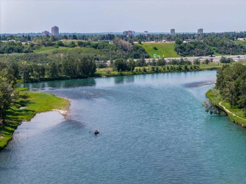 116 Riverbirch Crescent Se, Calgary, AB - Outdoor With Body Of Water With View