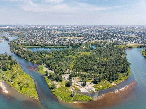 116 Riverbirch Crescent Se, Calgary, AB - Outdoor With Body Of Water With View