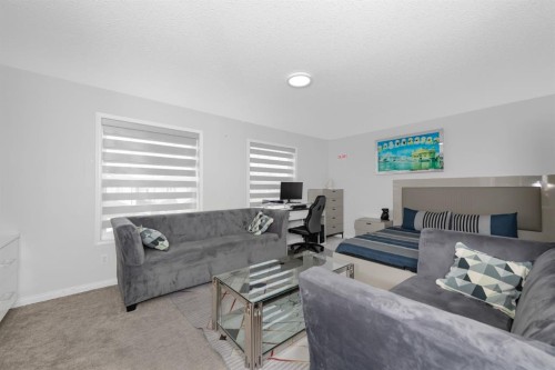 50 Saddleland Crescent Ne, Calgary, AB - Indoor Photo Showing Living Room