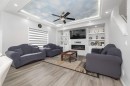50 Saddleland Crescent Ne, Calgary, AB  - Indoor Photo Showing Living Room With Fireplace 