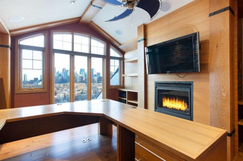 738 Crescent Road Nw, Calgary, AB - Indoor With Fireplace