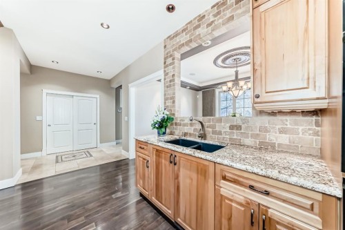 1108 Bellevue Avenue Se, Calgary, AB - Indoor Photo Showing Kitchen With Double Sink
