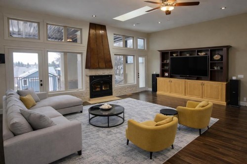 1108 Bellevue Avenue Se, Calgary, AB - Indoor Photo Showing Living Room With Fireplace