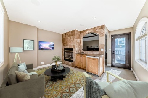 1108 Bellevue Avenue Se, Calgary, AB - Indoor Photo Showing Living Room With Fireplace