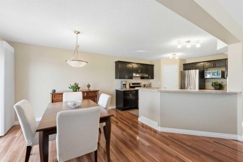 140 Arbour Stone Crescent Nw, Calgary, AB - Indoor Photo Showing Dining Room