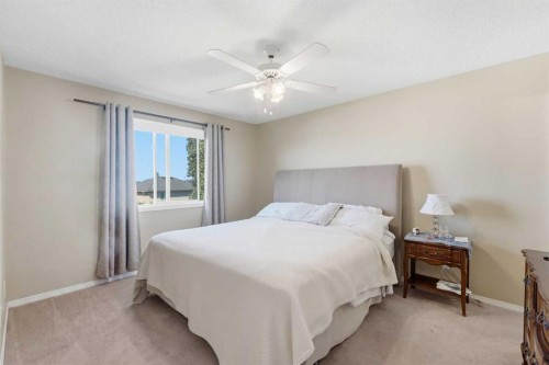 140 Arbour Stone Crescent Nw, Calgary, AB - Indoor Photo Showing Bedroom
