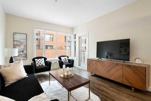 209-1720 10 Street Sw, Calgary, AB - Indoor Photo Showing Living Room