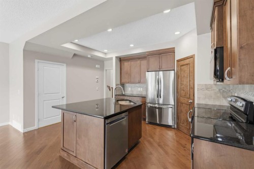 40 Panatella Mews Nw, Calgary, AB - Indoor Photo Showing Kitchen With Stainless Steel Kitchen