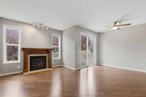 40 Panatella Mews Nw, Calgary, AB - Indoor Photo Showing Living Room With Fireplace