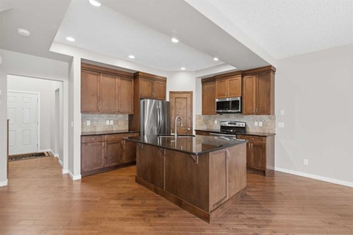40 Panatella Mews Nw, Calgary, AB - Indoor Photo Showing Kitchen With Stainless Steel Kitchen