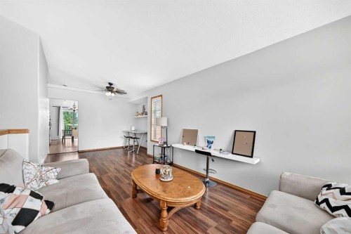 168 Country Hills Way Nw, Calgary, AB - Indoor Photo Showing Living Room