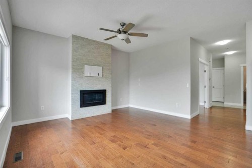 368 Nolanhurst Crescent Nw, Calgary, AB - Indoor Photo Showing Other Room With Fireplace