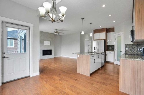 368 Nolanhurst Crescent Nw, Calgary, AB - Indoor Photo Showing Kitchen With Fireplace