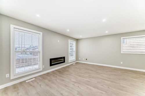 59 Templeson Road Ne, Calgary, AB - Indoor With Fireplace