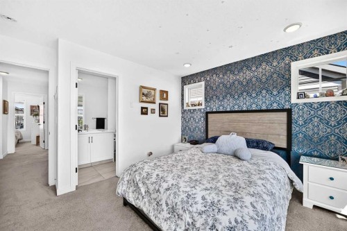 162 Silverado Boulevard Sw, Calgary, AB - Indoor Photo Showing Bedroom