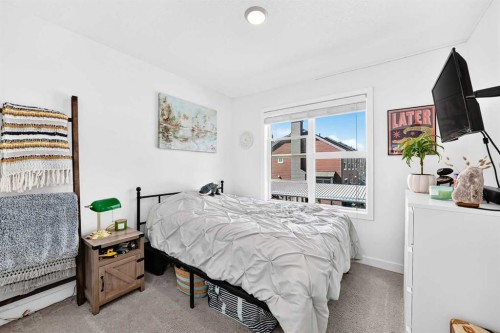 162 Silverado Boulevard Sw, Calgary, AB - Indoor Photo Showing Bedroom