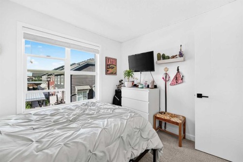 162 Silverado Boulevard Sw, Calgary, AB - Indoor Photo Showing Bedroom