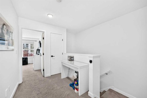 162 Silverado Boulevard Sw, Calgary, AB - Indoor Photo Showing Other Room