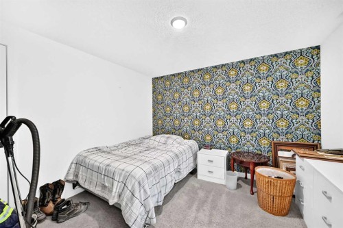 162 Silverado Boulevard Sw, Calgary, AB - Indoor Photo Showing Bedroom