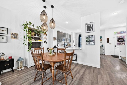 162 Silverado Boulevard Sw, Calgary, AB - Indoor Photo Showing Dining Room