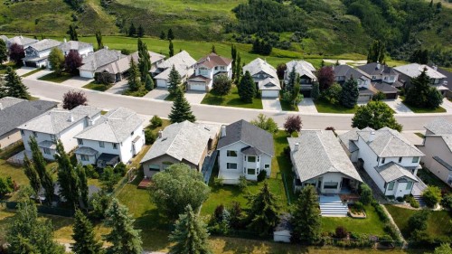 120 Gleneagles Terrace, Cochrane, AB - Outdoor With Facade