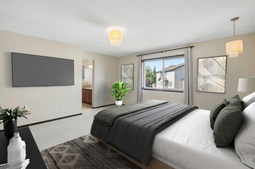 691 Panamount Boulevard Nw, Calgary, AB - Indoor Photo Showing Bedroom