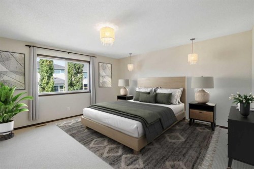 691 Panamount Boulevard Nw, Calgary, AB - Indoor Photo Showing Bedroom