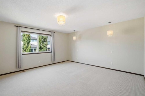 691 Panamount Boulevard Nw, Calgary, AB - Indoor Photo Showing Other Room
