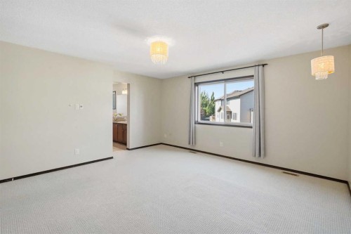 691 Panamount Boulevard Nw, Calgary, AB - Indoor Photo Showing Other Room
