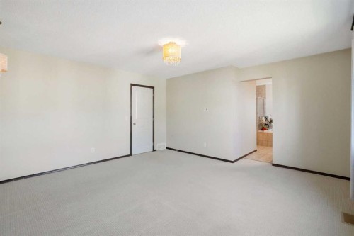 691 Panamount Boulevard Nw, Calgary, AB - Indoor Photo Showing Other Room