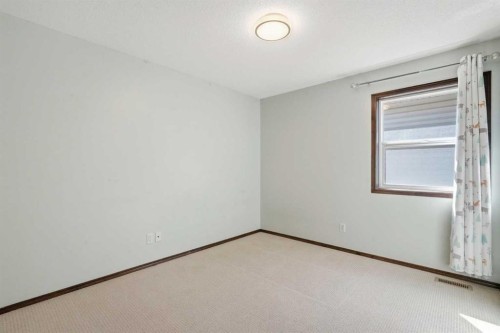 691 Panamount Boulevard Nw, Calgary, AB - Indoor Photo Showing Other Room