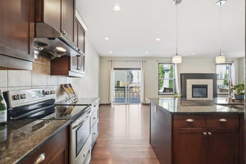691 Panamount Boulevard Nw, Calgary, AB - Indoor Photo Showing Kitchen With Upgraded Kitchen