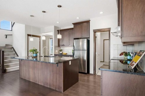 691 Panamount Boulevard Nw, Calgary, AB - Indoor Photo Showing Kitchen With Stainless Steel Kitchen With Upgraded Kitchen