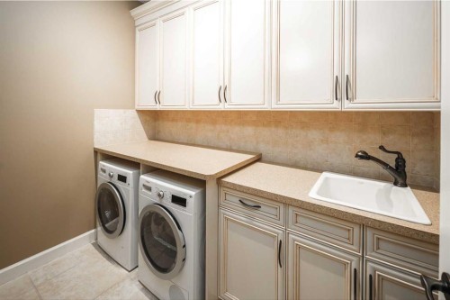 41 Cranleigh Park Se, Calgary, AB - Indoor Photo Showing Laundry Room
