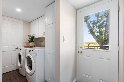 8 Midridge Bay Se, Calgary, AB - Indoor Photo Showing Laundry Room