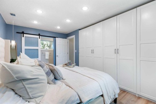 8 Midridge Bay Se, Calgary, AB - Indoor Photo Showing Bedroom