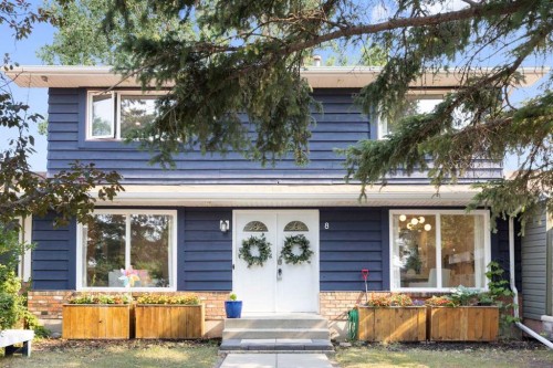 8 Midridge Bay Se, Calgary, AB - Outdoor With Facade