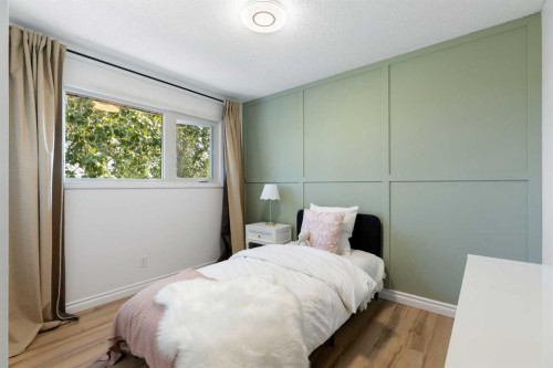 8 Midridge Bay Se, Calgary, AB - Indoor Photo Showing Bedroom