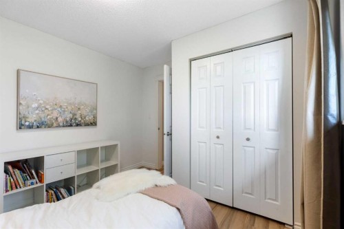 8 Midridge Bay Se, Calgary, AB - Indoor Photo Showing Bedroom