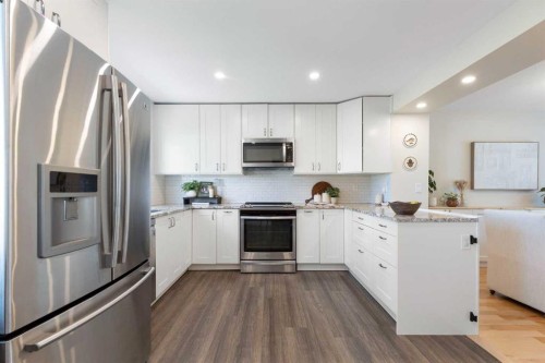 8 Midridge Bay Se, Calgary, AB - Indoor Photo Showing Kitchen With Upgraded Kitchen
