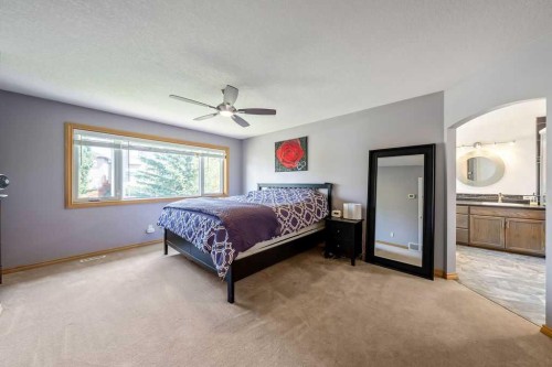391 Banister Drive, Okotoks, AB - Indoor Photo Showing Bedroom