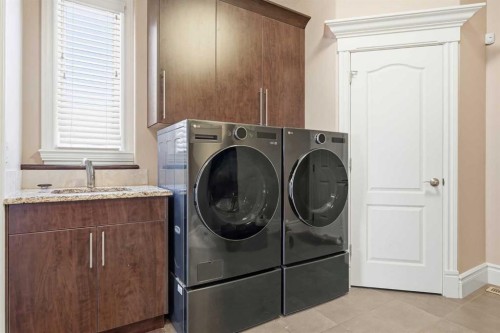 109 Aspen Ridge Place Sw, Calgary, AB - Indoor Photo Showing Laundry Room