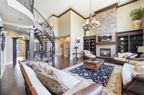109 Aspen Ridge Place Sw, Calgary, AB - Indoor Photo Showing Living Room With Fireplace