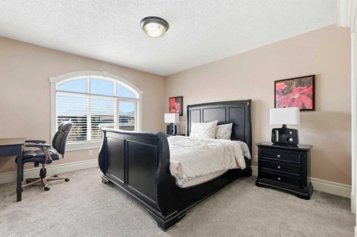 109 Aspen Ridge Place Sw, Calgary, AB - Indoor Photo Showing Bedroom