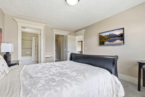 109 Aspen Ridge Place Sw, Calgary, AB - Indoor Photo Showing Bedroom